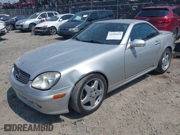 2003 Mercedes-Benz SLK 320 z VIN WDBKK65FX3F289228, wystawiony jako IAAI lot #42584634 z przebiegiem 173 232 mil mil oraz . Historia ofert i sprzedaży dostępna na DreamBid. Obrazek 2.
