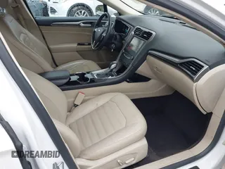 2014 Ford Fusion SE Hybrid with VIN 3FA6P0LU3ER312041, listed as a IAAI auction lot 41964588 with 138,566 mi miles and . Bid and sale history available at DreamBid. Image 5.