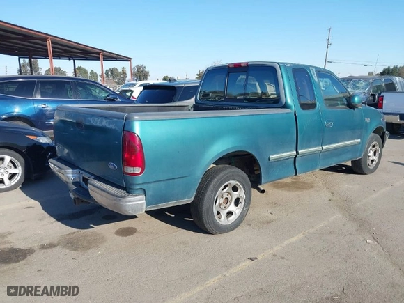 1997 Ford F-150 Standard with VIN 1FTDX1764VKB21915, listed as a IAAI auction lot 41435117 with 147,635 mi miles. Bid and sale history available at carsss.com. Image 4.