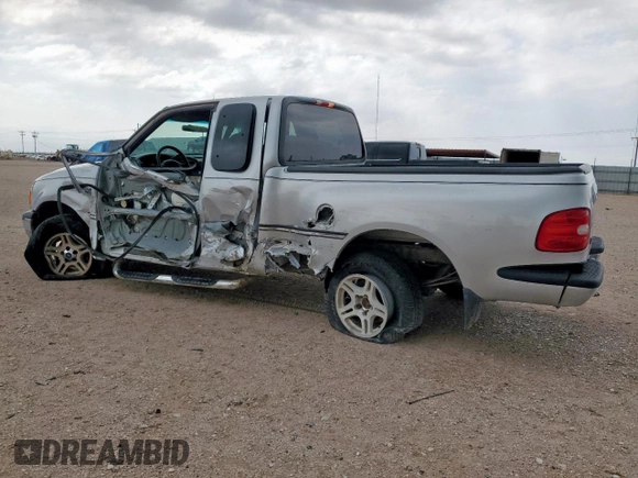 1999 Ford F-150 with VIN 1FTRX07W0XKB88434, listed as a Copart auction lot 60063135 with 277,188 mi miles and Salvage title. Bid and sale history available at DreamBid. Image 2.