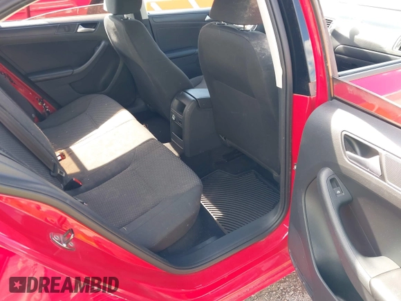 2014 Volkswagen Jetta S z VIN 3VW2K7AJ1EM434223, wystawiony jako IAAI lot #42245560 z przebiegiem 105 411 mil mil oraz . Historia ofert i sprzedaży dostępna na DreamBid. Obrazek 8.