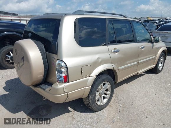 2006 Suzuki XL7 with VIN JS3TX92V064101841, listed as a IAAI auction lot 42672750 with 203,052 mi miles and . Bid and sale history available at DreamBid. Image 4.