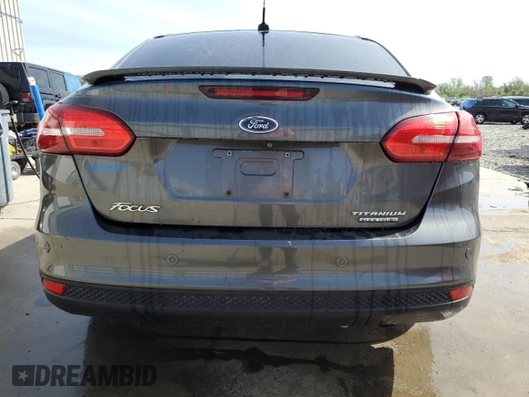 2015 Ford Focus Titanium с VIN 1FADP3J2XFL200668, выставлен на аукционе Copart как лот 54010865 с пробегом 138 459 миль миль и Списание • Salvage title. История ставок и продаж доступна на DreamBid. Изображение 6.