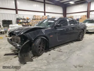 2013 Dodge Charger RT Plus with VIN 2C3CDXCT0DH729539, listed as a Copart auction lot 42966575 with 162,453 mi miles and Salvage Title. Bid and sale history available at carsss.com. Image 1.