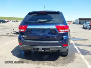 2012 Jeep Grand Cherokee Laredo with VIN 1C4RJFAG0CC160255, listed as a IAAI auction lot 41967809 with 127,702 mi miles. Bid and sale history available at carsss.com. Image 17.