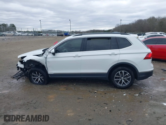 2020 Volkswagen Tiguan SE with VIN 3VV3B7AX2LM055418, listed as a IAAI auction lot 41248422 with Not Provided miles and . Bid and sale history available at DreamBid. Image 13.