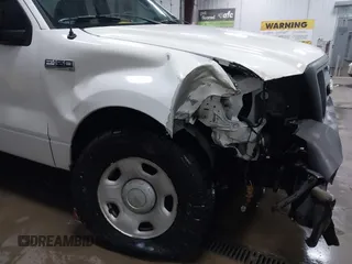 2007 Ford F-150 XL with VIN 1FTRF12267KC21885, listed as a IAAI auction lot 41278787 with 50,306 mi miles and . Bid and sale history available at DreamBid. Image 6.