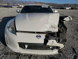 2014 Nissan 370Z Touring with VIN JN1AZ4EH7EM637101, listed as a Copart auction lot 41339705 with 105,841 mi miles and Salvage Title. Bid and sale history available at carsss.com. Image 5.