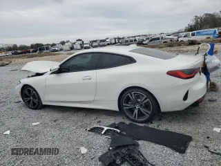 2023 BMW 4 Series 430i with VIN WBA53AP00PCL74865, listed as a Copart auction lot 89057895 with 9,000 mi miles and Salvage title. Bid and sale history available at DreamBid. Image 2.