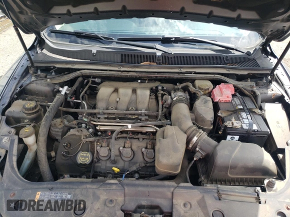 2014 Ford Taurus Limited with VIN 1FAHP2F84EG149622, listed as a Copart auction lot 63764675 with 208,801 mi miles and Salvage title. Bid and sale history available at DreamBid. Image 11.