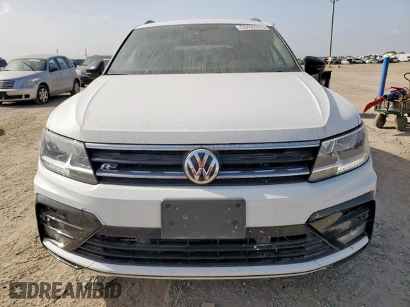 2021 Volkswagen Tiguan SE z VIN 3VV3B7AX9MM003432, wystawiony jako Copart lot #63422315 z przebiegiem 64 531 mil mil oraz Czysty tytuł • Clean title. Historia ofert i sprzedaży dostępna na DreamBid. Obrazek 5.