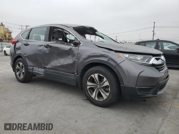 2017 Honda CR-V LX z VIN 2HKRW5H3XHH402429, wystawiony jako Copart lot #57440845 z przebiegiem 17 617 mil mil oraz Szkoda całkowita • Salvage title. Historia ofert i sprzedaży dostępna na DreamBid. Obrazek 4.