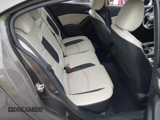 2015 Mazda 3 S Grand Touring with VIN JM1BM1M35F1264244, listed as a IAAI auction lot 41674683 with 119,684 mi miles and . Bid and sale history available at DreamBid. Image 8.