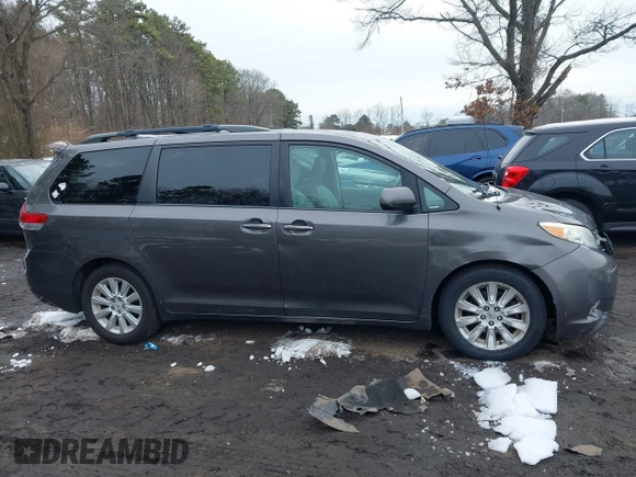 2012 Toyota Sienna XLE with VIN 5TDDK3DC9CS047014, listed as a IAAI auction lot 41551585 with 164,440 mi miles. Bid and sale history available at carsss.com. Image 13.