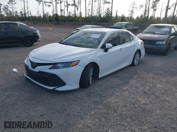 2019 Toyota Camry LE with VIN 4T1B11HK7KU806197, listed as a IAAI auction lot 41721148 with 83,373 mi miles and . Bid and sale history available at DreamBid. Image 17.