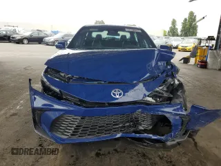 2025 Toyota Camry LE z VIN 4T1DAACK9SU164954, wystawiony jako Copart lot #60821285 z przebiegiem 9 924 mil mil oraz Szkoda całkowita • Salvage title. Historia ofert i sprzedaży dostępna na DreamBid. Obrazek 5.