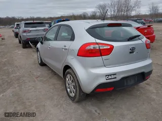 2014 Kia Rio LX with VIN KNADM5A34E6338174, listed as a IAAI auction lot 42039451 with 87,528 mi miles. Bid and sale history available at carsss.com. Image 3.