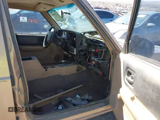 1999 Jeep Cherokee SE with VIN 1J4FF28S5XL520501, listed as a IAAI auction lot 41706800 with Not provided miles and . Bid and sale history available at DreamBid. Image 5.