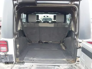 2007 Jeep Wrangler Unlimited X with VIN 1J4GA39187L209448, listed as a IAAI auction lot 42104328 with 138,302 mi miles and . Bid and sale history available at DreamBid. Image 17.
