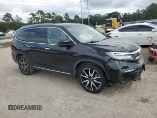 2021 Honda Pilot Touring 8-Passenger with VIN 5FNYF5H96MB000075, listed as a Copart auction lot 79339844 with 53,078 mi miles and Salvage Title. Bid and sale history available at DreamBid. Image 4.