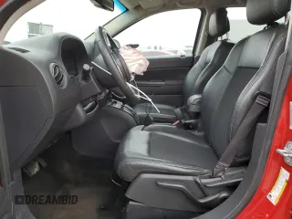 2017 Jeep Compass Sport SE with VIN 1C4NJDBB3HD101563, listed as a Copart auction lot 57853295 with 128,445 mi miles and Salvage title. Bid and sale history available at DreamBid. Image 7.