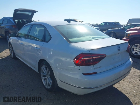 2019 Volkswagen Passat 2.0T Wolfsburg Edition with VIN 1VWLA7A32KC000818, listed as a IAAI auction lot 41711518 with 87,873 mi miles. Bid and sale history available at carsss.com. Image 3.
