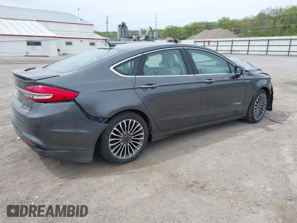2018 Ford Fusion Titanium with VIN 3FA6P0RU1JR120392, listed as a IAAI auction lot 42145342 with Not provided miles and . Bid and sale history available at DreamBid. Image 4.