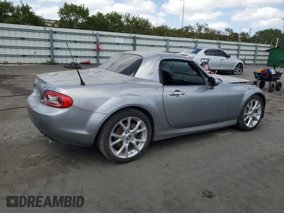 2015 Mazda MX-5 Miata Grand Touring z VIN JM1NC2PF0F0238698, wystawiony jako Copart lot #55455395 z przebiegiem Nie podano mil oraz Szkody całkowita. Historia ofert i sprzedaży dostępna na DreamBid. Obrazek 3.