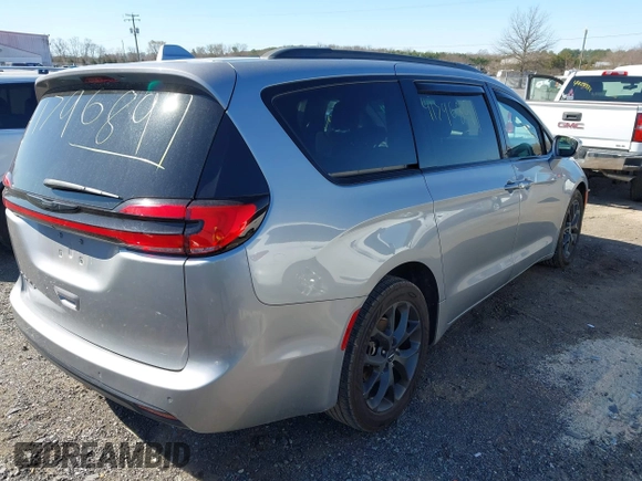 2021 Chrysler Pacifica Touring z VIN 2C4RC1FG8MR565455, wystawiony jako IAAI lot #41796891 z przebiegiem 105 645 mil mil oraz . Historia ofert i sprzedaży dostępna na DreamBid. Obrazek 4.