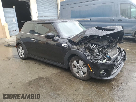 2021 MINI Hardtop Cooper с VIN WMWXR3C06M2N12998, выставлен на аукционе Copart как лот 79142464 с пробегом 44 825 миль миль и Списание • Salvage title. История ставок и продаж доступна на DreamBid. Изображение 4.
