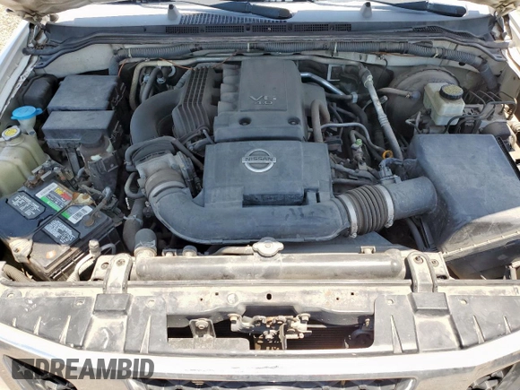 2009 Nissan Frontier SE with VIN 1N6AD07U29C400846, listed as a Copart auction lot 56419735 with 143,005 mi miles and Salvage title. Bid and sale history available at DreamBid. Image 11.
