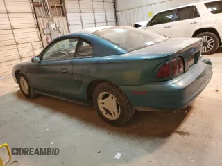 1996 Ford Mustang with VIN 1FALP4049TF152546, listed as a Copart auction lot 83665864 with 101,140 mi miles and Salvage Title. Bid and sale history available at carsss.com. Image 2.