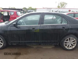 2011 Ford Fusion SEL with VIN 3FAHP0JA2BR209979, listed as a IAAI auction lot 42143065 with 185,192 mi miles and . Bid and sale history available at carsss.com. Image 14.