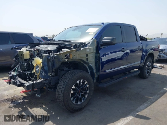 2021 Nissan Titan Pro-4X with VIN 1N6AA1ED3MN531427, listed as a IAAI auction lot 42615123 with 53,695 mi miles and . Bid and sale history available at DreamBid. Image 2.