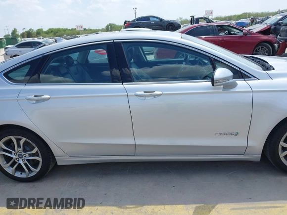 2019 Ford Fusion Titanium with VIN 3FA6P0RUXKR106430, listed as a IAAI auction lot 42329931 with 73,259 mi miles and . Bid and sale history available at DreamBid. Image 13.
