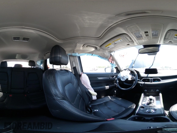 2020 Mazda CX-5 Grand Touring with VIN JM3KFADM9L1837183, listed as a IAAI auction lot 42340628 with 81,975 mi miles and . Bid and sale history available at DreamBid. Image 20.