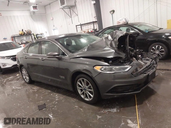 2018 Ford Fusion Energi SE with VIN 3FA6P0PU3JR203714, listed as a IAAI auction lot 41698507 with 168,609 mi miles. Bid and sale history available at carsss.com. Image 1.