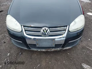 2008 Volkswagen Jetta S z VIN 3VWJM71K98M124551, wystawiony jako IAAI lot #42365053 z przebiegiem 198 002 mil mil oraz . Historia ofert i sprzedaży dostępna na DreamBid. Obrazek 6.