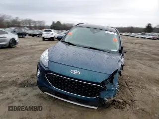 2020 Ford Escape Titanium z VIN 1FMCU9J91LUA73891, wystawiony jako Copart lot #89178475 z przebiegiem 35 579 mil mil oraz Szkoda całkowita • Salvage title. Historia ofert i sprzedaży dostępna na DreamBid. Obrazek 11.