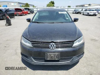 2014 Volkswagen Jetta SE with VIN 3VWD17AJ0EM268515, listed as a Copart auction lot 59977225 with 163,365 mi miles and Salvage title. Bid and sale history available at DreamBid. Image 5.