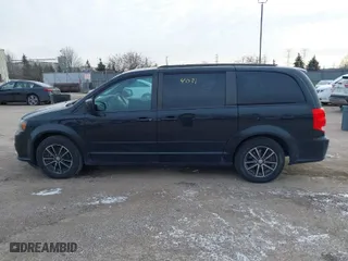 2016 Dodge Grand Caravan R/T with VIN 2C4RDGEG7GR270661, listed as a IAAI auction lot 41274031 with 124,747 mi miles. Bid and sale history available at carsss.com. Image 14.