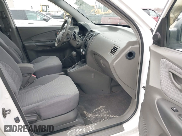 2006 Hyundai Tucson GL with VIN KM8JM12BX6U467288, listed as a IAAI auction lot 41679827 with 146,973 mi miles. Bid and sale history available at carsss.com. Image 5.