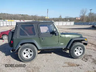 2006 Jeep Wrangler Rubicon z VIN 1J4FA69SX6P788424, wystawiony jako IAAI lot #41712349 z przebiegiem 121 684 mil mil oraz . Historia ofert i sprzedaży dostępna na DreamBid. Obrazek 14.