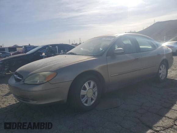 2003 Ford Taurus SEL Deluxe with VIN 1FAFP56S23G221922, listed as a Copart auction lot 79673294 with 142,911 mi miles and Salvage Title. Bid and sale history available at DreamBid. Image 1.