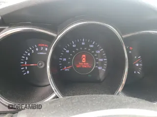 2013 Kia Optima LX z VIN 5XXGM4A79DG144608, wystawiony jako Copart lot #57461585 z przebiegiem 120 677 mil mil oraz Szkoda całkowita • Salvage title. Historia ofert i sprzedaży dostępna na DreamBid. Obrazek 9.