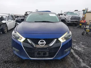 2016 Nissan Maxima SL with VIN 1N4AA6APXGC396890, listed as a IAAI auction lot 41594044 with 144,164 mi miles and . Bid and sale history available at DreamBid. Image 12.