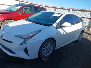 2016 Toyota Prius Two with VIN JTDKBRFU3G3013058, listed as a IAAI auction lot 41824822 with 137,392 mi miles. Bid and sale history available at carsss.com. Image 2.