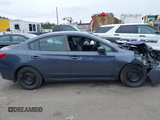 2017 Subaru Impreza with VIN 4S3GKAA63H3603908, listed as a IAAI auction lot 42042636 with 62,697 mi miles and . Bid and sale history available at DreamBid. Image 14.