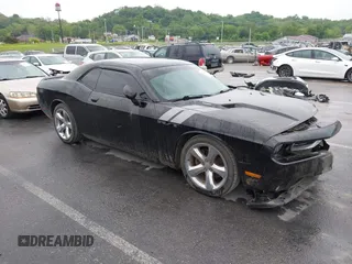 2012 Dodge Challenger R/T z VIN 2C3CDYBT8CH117255, wystawiony jako IAAI lot #42219862 z przebiegiem 121 633 mil mil oraz . Historia ofert i sprzedaży dostępna na DreamBid. Obrazek 1.