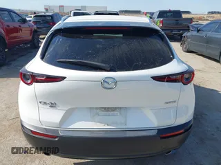 2023 Mazda CX-30 S Carbon Edition with VIN 3MVDMBCM2PM552282, listed as a IAAI auction lot 42241909 with 14,765 mi miles and . Bid and sale history available at DreamBid. Image 16.